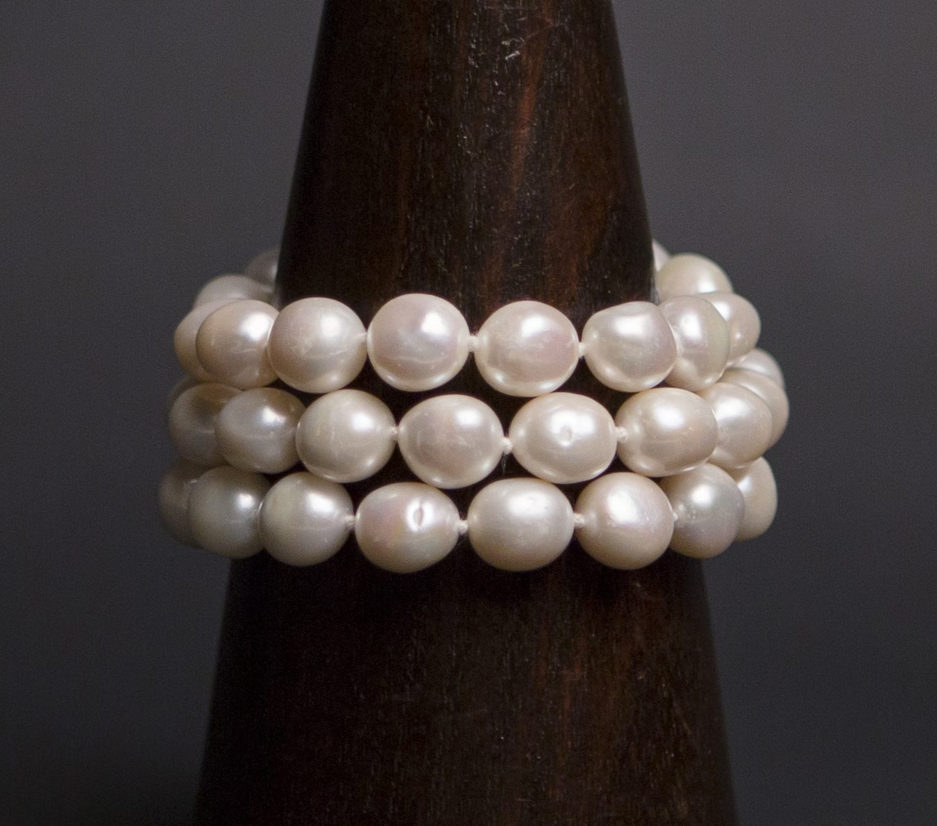 Triple strand white baroque pearl bracelet