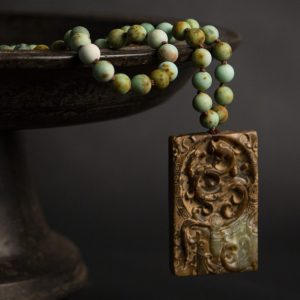 Jade vintage gossip map pendant on matt chrysoprase flapper