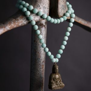 Jade vintage buddha on mint green jade flapper