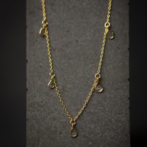 Diamond slice and chain leaf necklace, gold vermeil